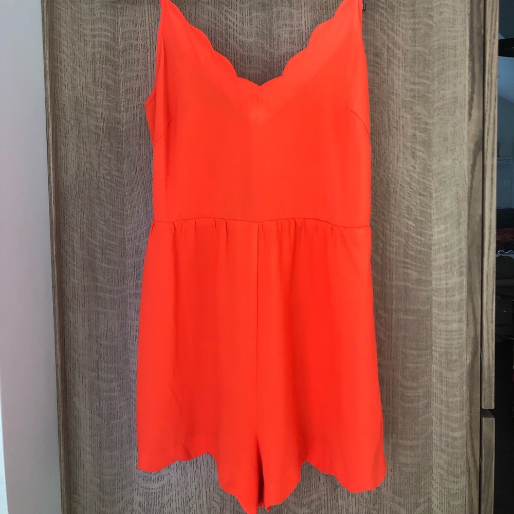 Lush orange scalloped romper